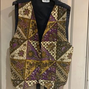Vintage dalin vest decorated with o lot of beads.